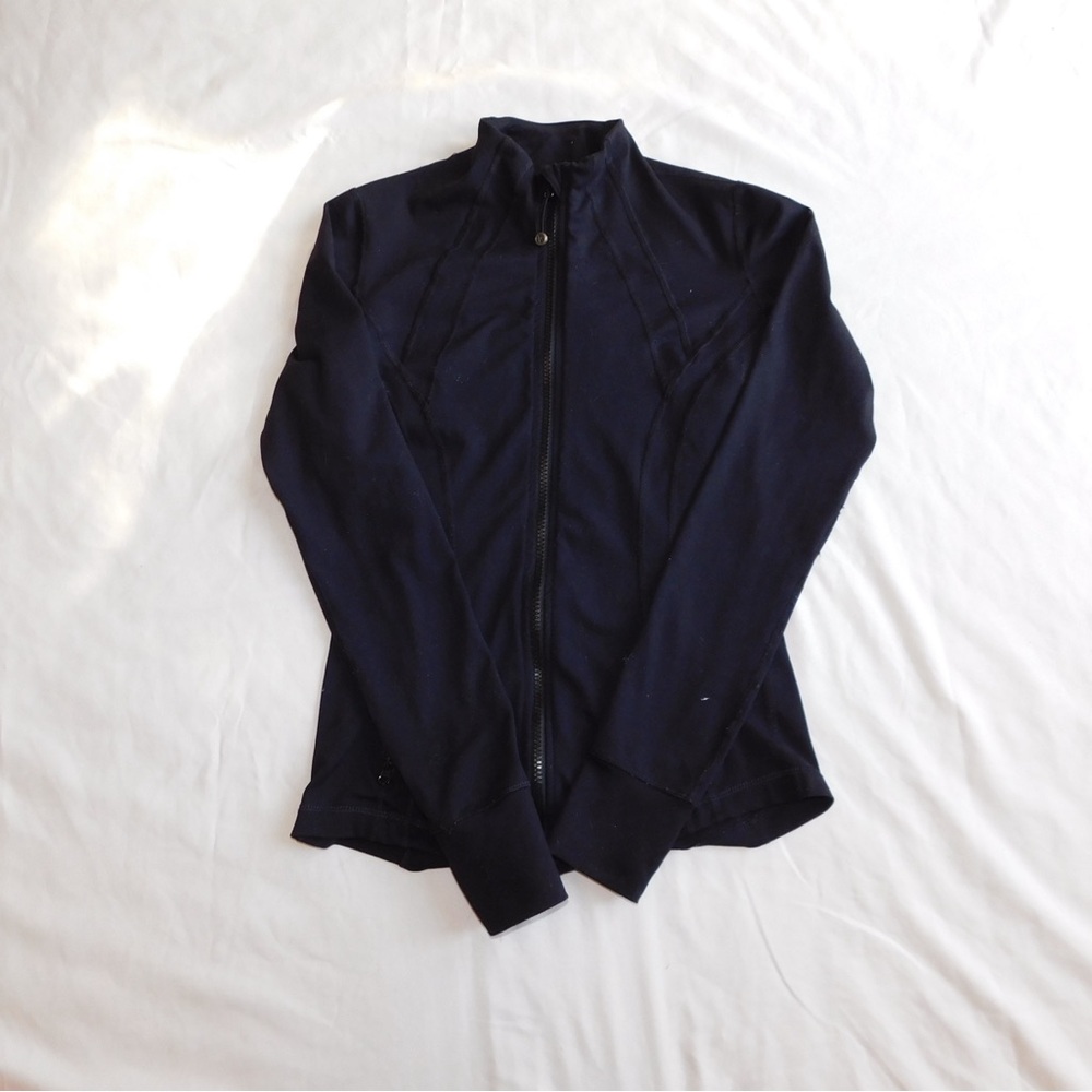 Women’s black athletic zip up